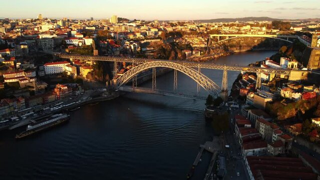 Drone view of Luis I Bridge in Porto with beautiful residential areas.