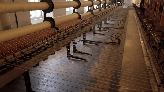 A working 'Mule' at a textile mill.  Used in Cotton production. Spinning