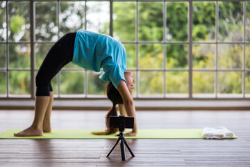 recording yoga bridge pose video content for streaming online class