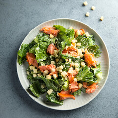 Homemade Caesar salad with smoked salmon