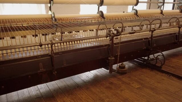 A working 'Mule' at a textile mill.  Used in Cotton production. Spinning