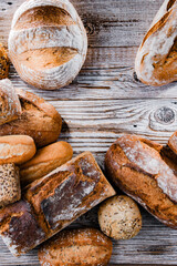 Composition with assorted bakery products on wooden table