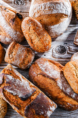 Composition with assorted bakery products on wooden table