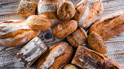 Composition with assorted bakery products on wooden table