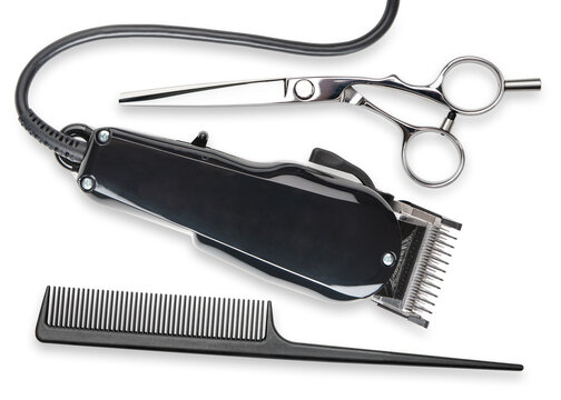 Hair clipper, Scissors, comb. Professional barber hair clipper and shears for Men haircut. Hairdresser salon equipment. Premium hairdressing Accessories. Top view flat lay isolated on white background - Powered by Adobe