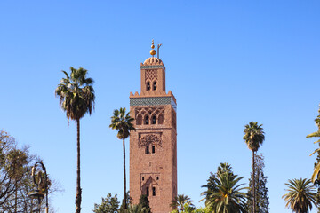 Fototapeta premium Minaret of Koutoubia mosque on blue sky background in Marrakech, Morocco