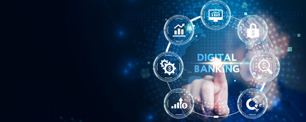 Fototapeta premium Business, technology, internet and networking concept. Young businessman working on his tablet in the office, select the icon digital banking on the virtual display.