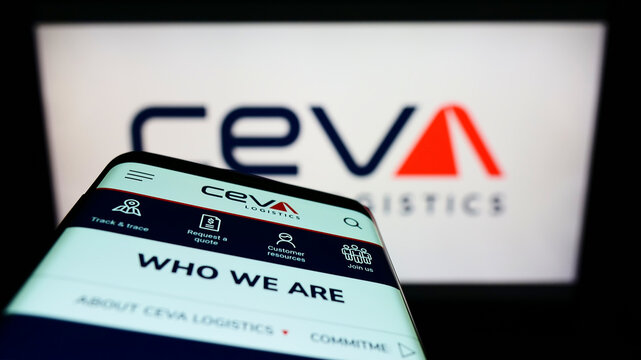 Stuttgart, Germany - 03-12-2022: Mobile phone with website of French freight company CEVA Logistics on screen in front of business logo. Focus on top-left of phone display.