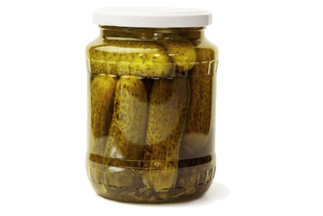 Canned cucumbers in a glass jar on a white background