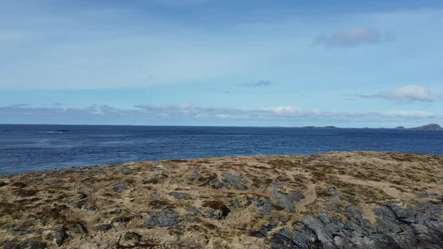 majestic sea, mountain and island view from the island of Heroy in nordland giving a small view of the massive archipelago and the diverse landscape of the region