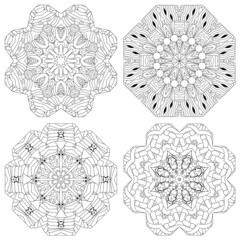 Hand drawn zentangle set of 4 mandalas for coloring page.