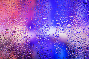 Condensation on the clear glass window. Water drops. Rain. Abstract background texture
