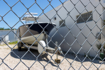 Boat storage behind fence