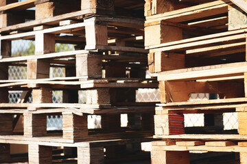 Industrial wood pallets stacked