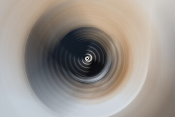 dark blue and beige circular waves abstract background