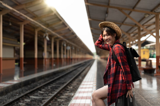 Happy Asia Woman Traveller Feeling Happiness Before Go To Travel At The Train Station, Summer Travel And Lifestyle Concept