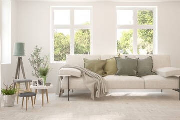 Fototapeta premium White living room with sofa and summer landscape in window. Scandinavian interior design. 3D illustration