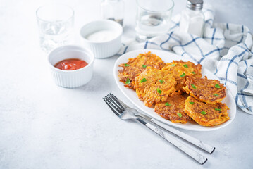 Sweet potato hash browns with sauce in a plate