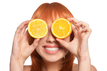 Portrait of young woman posing with oranges on white background