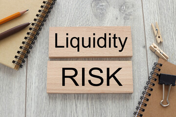 Liquidity Risk. text on wooden blocks on wooden background