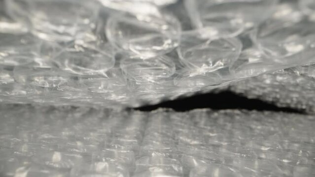Bubble, air film for packaging. Dolly slider extreme close-up. Laowa Probe