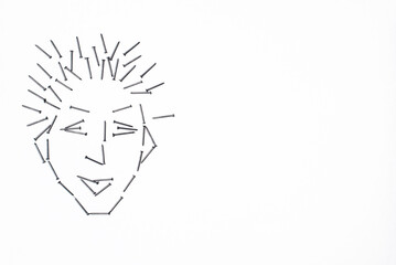 nails on the white background like portrair of man