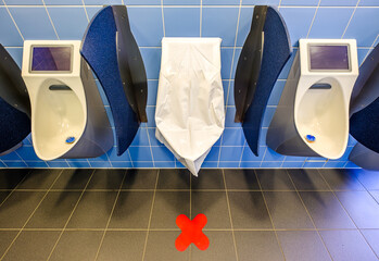typical urinals at a public restroom