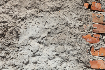 Texture of an old plastered brick wall.