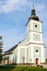 Fototapeta premium LIESEK, SLOVAKIA - APRIL 30, 2022: St. Michael the Archangel Church in Liesek, Slovakia.