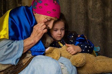 Children in a bomb shelter. War in Ukraine. The child is hiding in the basement because of the war....