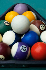 Pool table with rack of balls