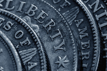 Old US coins with inscription: Liberty as symbol: America is the land of opportunities and freedom. Close up.