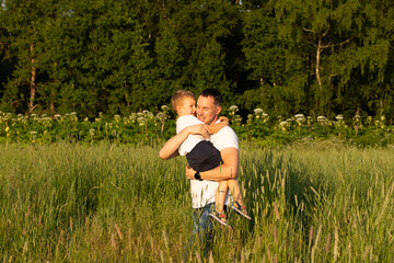 Father and son on the field