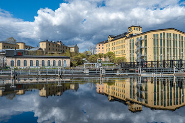 The historic industrial landscape at Drags in Norrkoping, Sweden during spring.