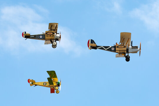 Avalon, Australia - February 25, 2015: Royal Aircraft Factory R.E.8 (replica) Aircraft Used During The First World War Flying In Formation With A Nieuport 17 And A Sopwith Camel.