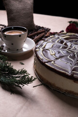 Cheesecake with coffee on a tabl