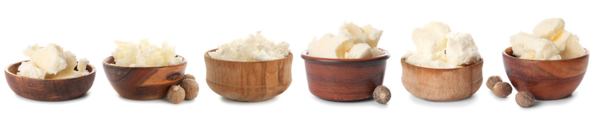 Set of bowls with shea butter isolated on white