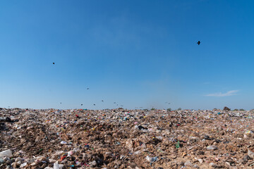UBOLRATTHANI THAILAND- FEB 21: People collect  gabage from  Removal and landfill waste from industry and households in rural grasslands. Jebruary 10, 2022 in Ubolrat thani province,Thailand