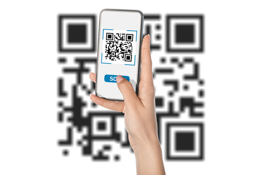 Hand of woman with smartphone scanning QR code on white background