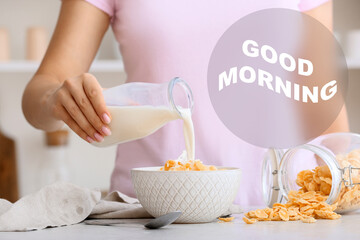 Woman having corn flakes with milk for breakfast. Good morning
