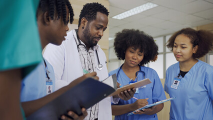 Doctor and intern team or student trainee meeting and discuss about patient's Health at hospital.