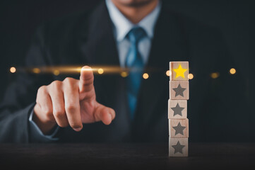 Business men press virtual screen a golden star sparkling. Being a winner Concept.