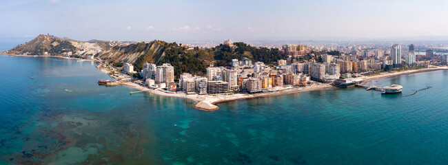 Scenic panoramic aerial view of Durres cityscape on Albanian Adriatic coast with wide landscaped...