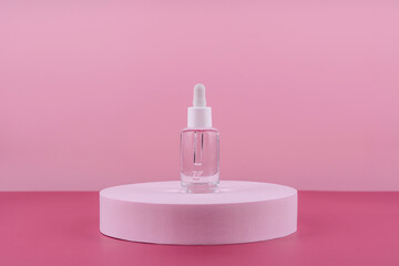 Serum cosmetic bottle with peptides and retinol on platform pedestal on pink background. Hyaluronic acid cosmetics transparent fashion product packaging with stylish props. Serum beauty dropper mockup