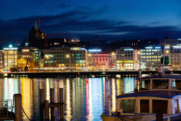 View on historic city center of Geneva from Lake at night, Switzerland