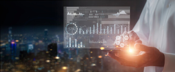 Businessman hand holds mobilephone with simulation statistics screen of business. Business man analysis screen chart with mobile phone. business stock market  concept