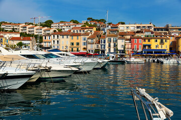 Fototapeta premium Landscape with yachts and fishing boats in harbour of Cassis on sunny summer day, Provence, France