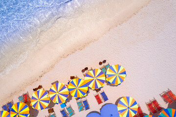 Fototapeta na wymiar high angle view of the sea and the sand and the beach umbrella at rest Enjoy the view and beautiful blue waters on the Andaman Sea island.