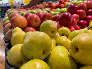 Retail produce green and red apples display