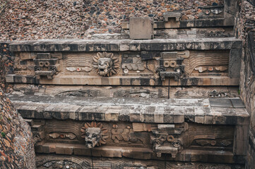 Stone carving details at the Temple of Quetzalcoatl (the Feathered Serpent) at Teotihuacan ancient...